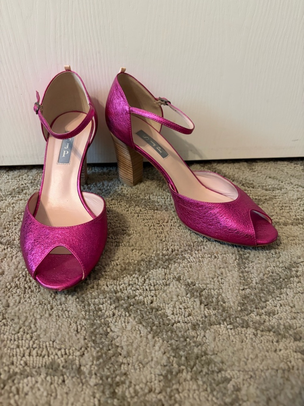 Pink SJP peep toe pumps